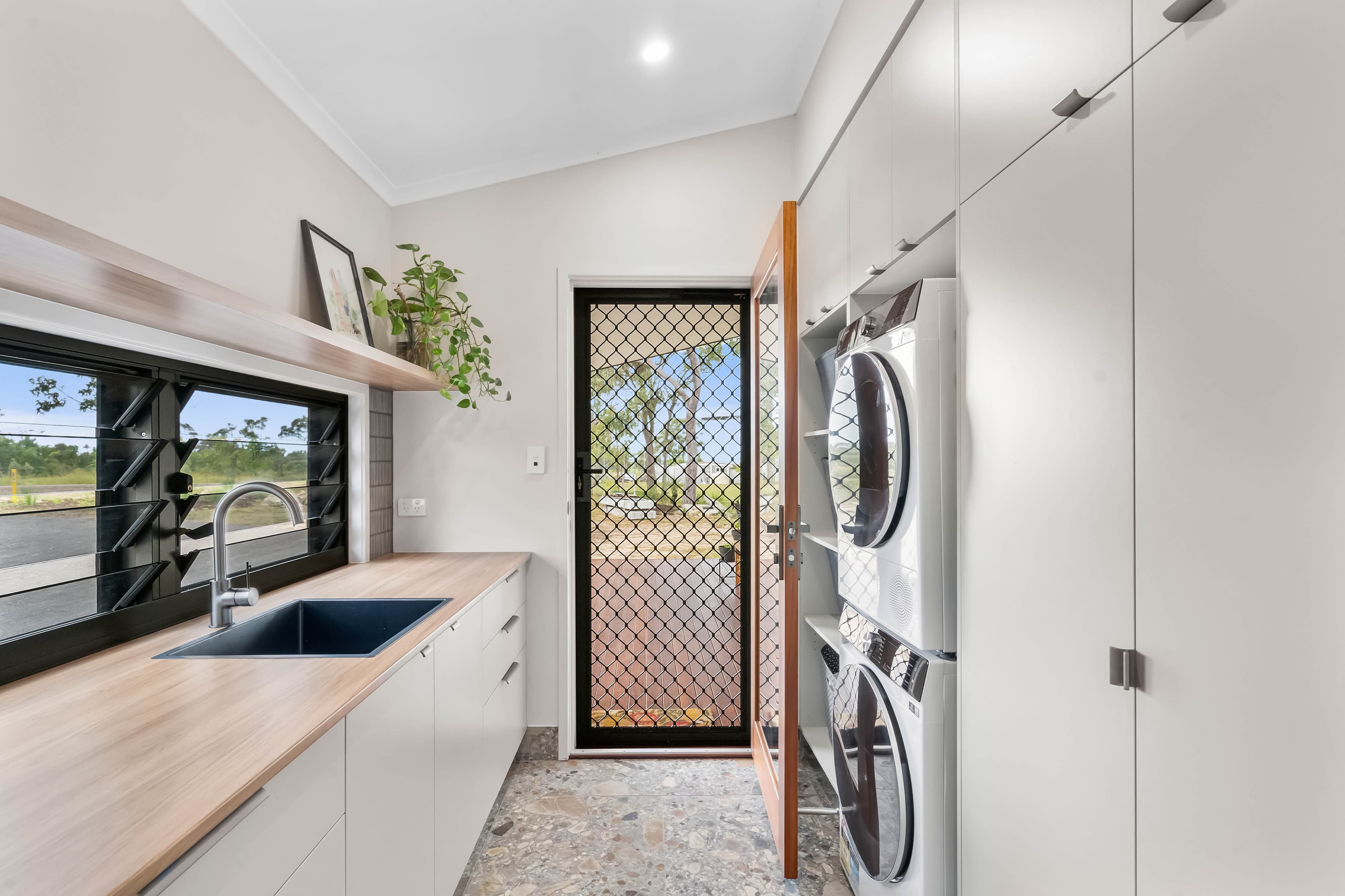 Oly Homes Modular 4 bedroom Bagara home design laundry