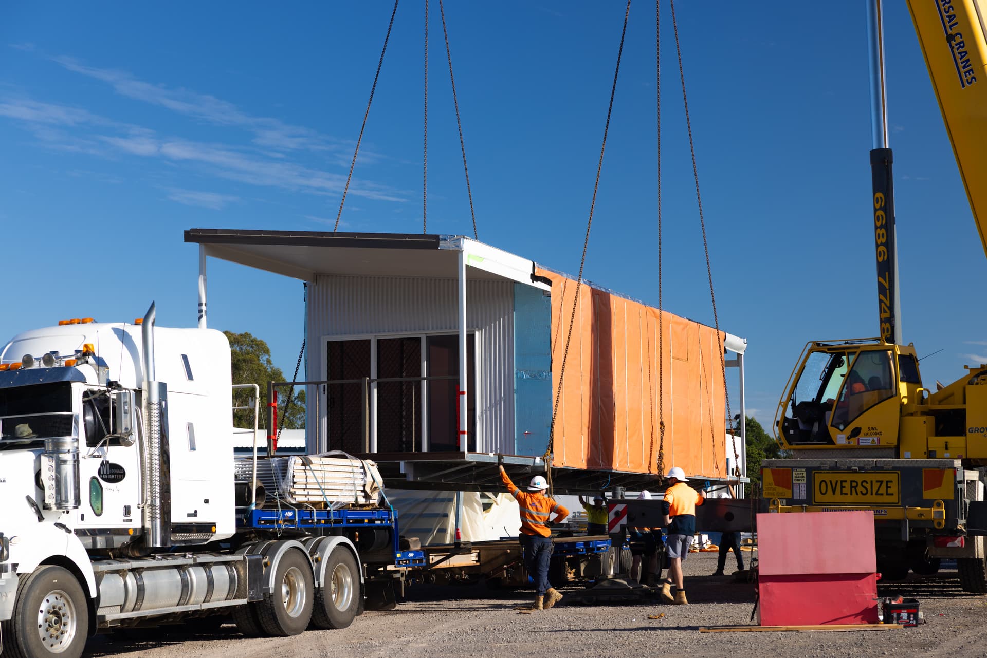 RAAF DHA Oly Homes - loading a modular home for transport