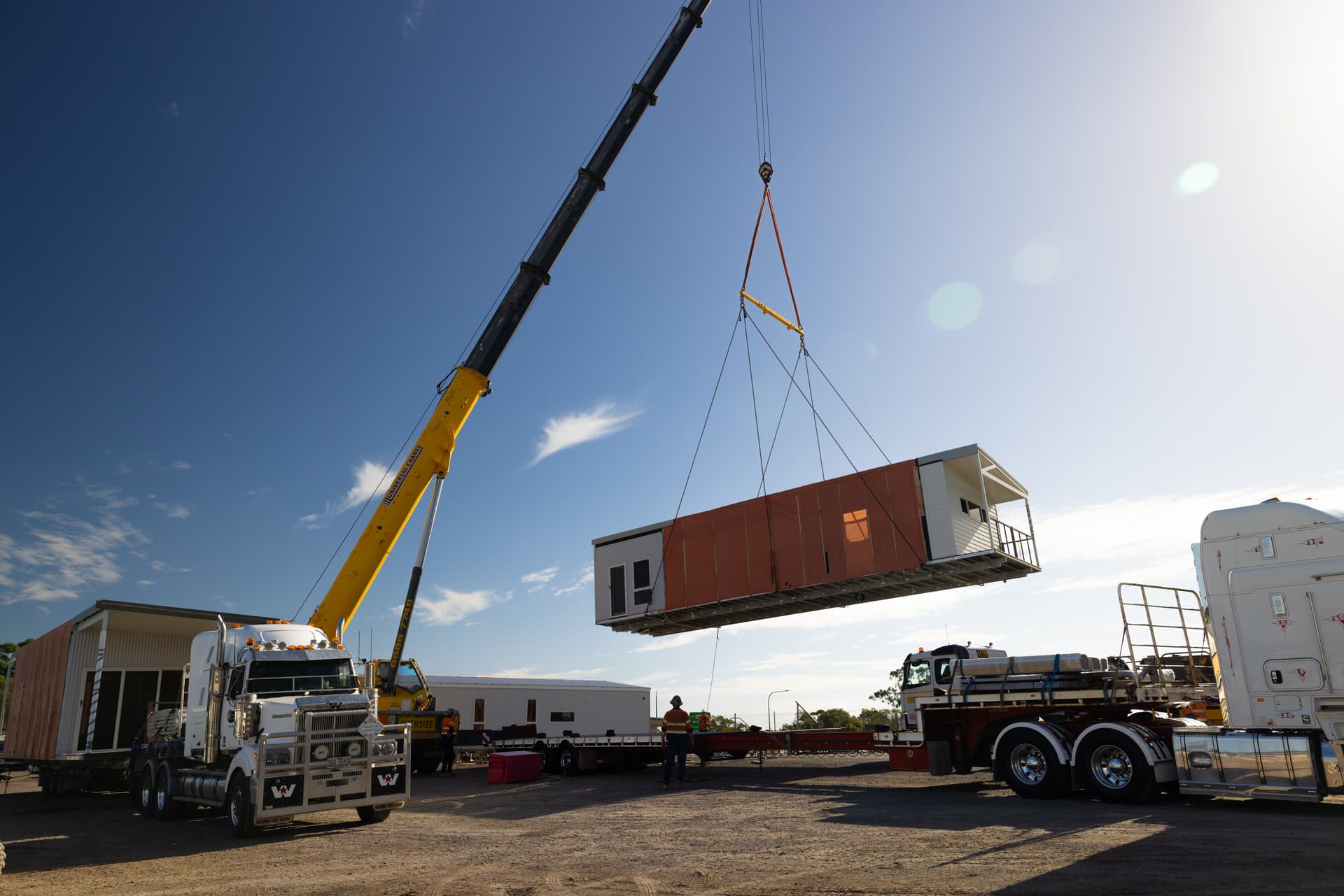 RAAF DHA Oly Homes - loading a modular home for transport